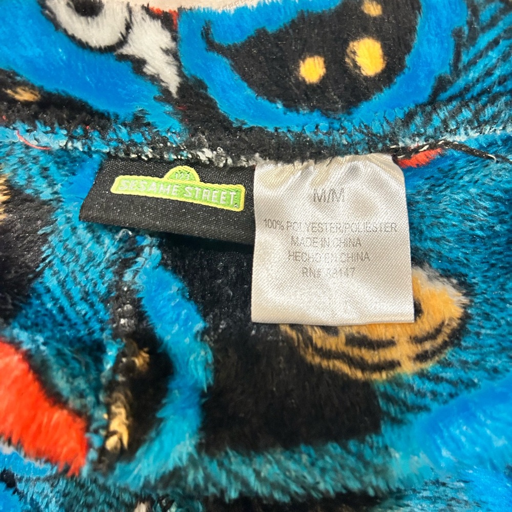 Sesame Street Plush Blanket with Blue and Red Accents